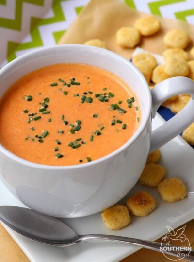 Tomatoes, onion and garlic, roasted to perfection then turned into a beautiful soup that's so easy to make.  One spoonful of this creamy, luscious soup and you'll be a fan for life!