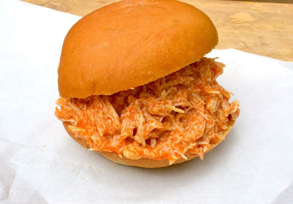 Enjoy this easy to make recipe on sandwiches, in dips or whenever you're looking to amp up the flavor of a baked potato. Buffalo Chicken cooked low and slow in the crock pot is a recipe with so many uses!