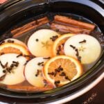 Crock Pot Mulled Cider with brown sugar, cinnamon, cloves, apples and oranges should be named the official drink of fall!