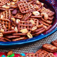 Pretzels and nuts tossed in butter and buffalo wing sauce are turned into a spicy, savory treat that great for game day snacking!