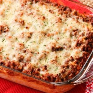 Bake Spaghetti taken to a whole new level three cheeses and a meaty tomato sauce. It is out of the world delicious, freezes beautifully and perfect for covered dish suppers.