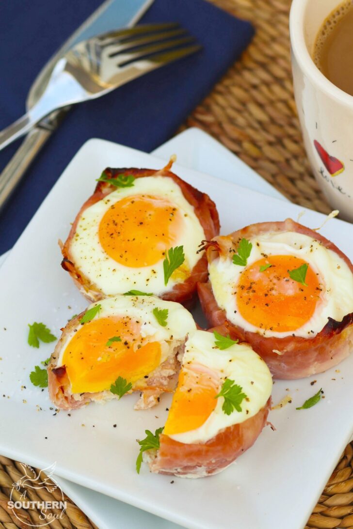 Ham and Cheese Egg Cups made in a muffin tin are a low carb breakfast that downright delicious. They are super easy to make with three ingredients are are ready to enjoy in less than 20 minutes.