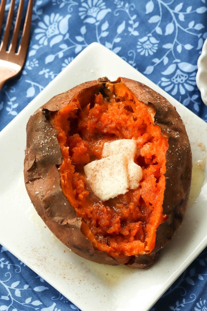 Sweet Potatoes cooked perfectly in the Air Fryer then seasoned with salt and cinnamon sugar along with butter is an amazing easy to make side dish.