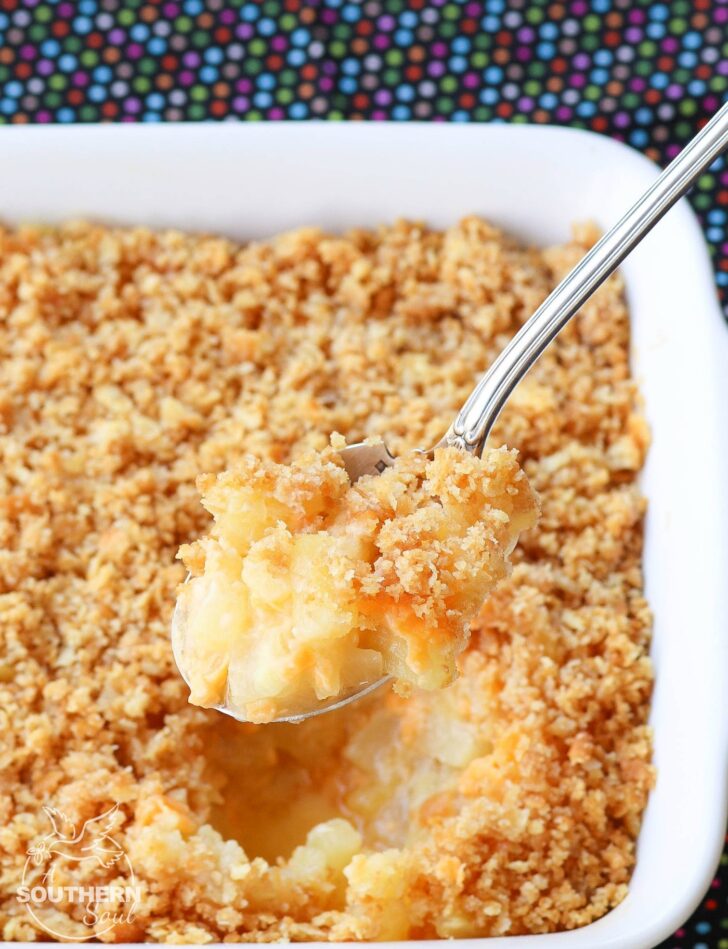 Southern Pineapple Casserole is a classic dish made with pineapple and cheese topped with a buttery cracker crust.