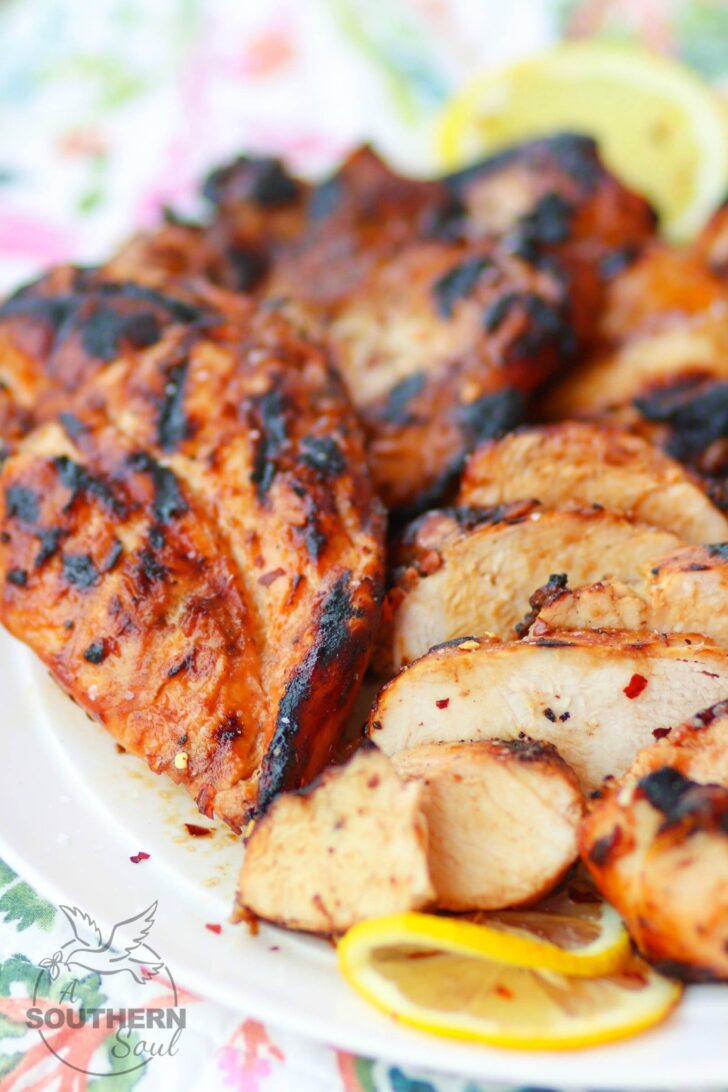 Sweet Heat BBQ Chicken made with your favorite BBQ sauce, Italian dressing, honey and red pepper flakes then grilled to perfection is a dish you'll make over and over again!