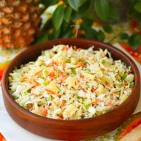 Pineapple Slaw is made with pineapple chunks, bagged cabbage, sliced almonds and green onions with a light, sweet dressing is a side dish that is great for any occasion!