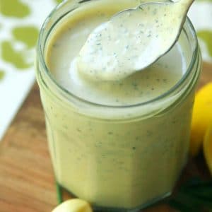 Green Goddess Dressing made with chives, parsley, garlic mayonnaise, sour cream and a few other ingredients is a classic recipe for salads, fish and pasta.