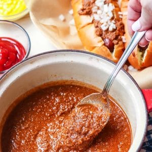 Home Run Hot Dog Chili is the best topping for your grilled dogs. Made with ground beef, herbs and spices for a savory recipe that's easy to make.