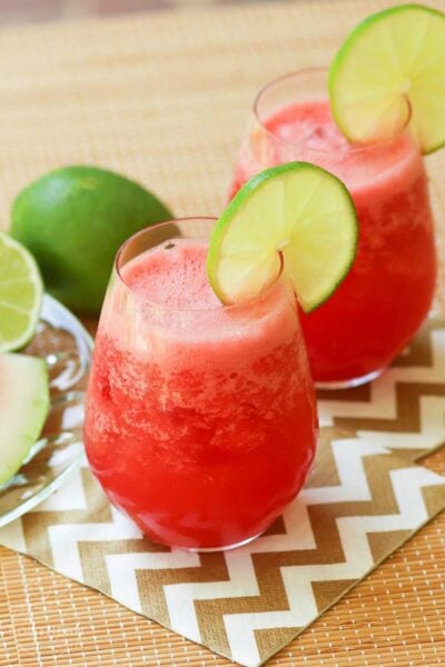 Watermelon Cooler Cocktail is the perfect summer sipper. Make with fresh watermelon, lime juice and a bit of sugar and splash of tequila. For a drink the kids will love, just leave out the alcohol!