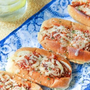 Homemade Meatballs simmered in rich tomato sauce then loaded into toasted sub rolls and topped with cheese. This is a hearty sandwich that's totally irresistible!