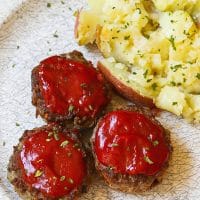 Meatloaf Muffins made with ground beef, eggs, bread crumbs, Parmesan Cheese and seasoned to perfect are easy to make and perfect for a weeknight meal!
