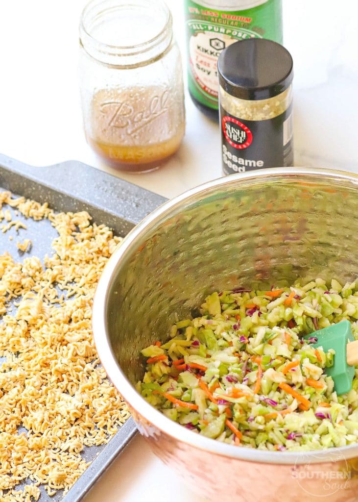 Ramen Broccoli Slaw made with toasted, packaged noodles, broccoli, carrots, green onion and a savory sweet dressing is a delicious side dish. Perfect for a weeknight meal, cookout, pot luck or covered dish supper.