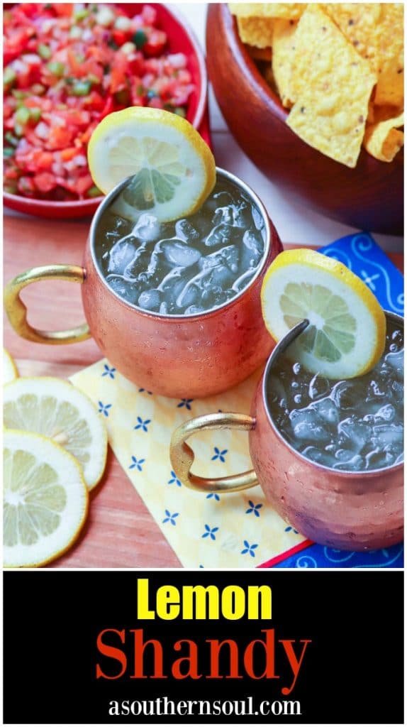 Refreshing lemon shandy made with your favorite beer, lemonade and a twist of lemon is a great drink for summer, tailgating, game day or backyard cookouts.