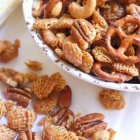 Sweet and Nutty Snack Mix made with brown sugar, butter and corn syrup, them baked until golden brown is a snack that's totally irresistible!