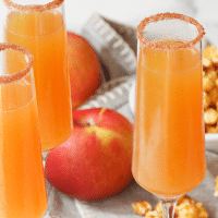 Apple Cider Mimosas made with apple cider and champagne is a simple two ingredient drink that's perfect for celebrating fall!