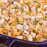 Apple Sausage Dressing is an easy to make recipe that's perfect for the holidays. Made with apples, sausage, herbs, spices and two kinds of bread, this side is great with turkey, pork and ideal served with gravy.