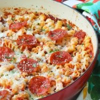 Pizza Pasta Bake is the perfect combination of all your favorite pizza flavors baked with tender pasta and cheese. It's a quick and easy main dish that everyone loves!