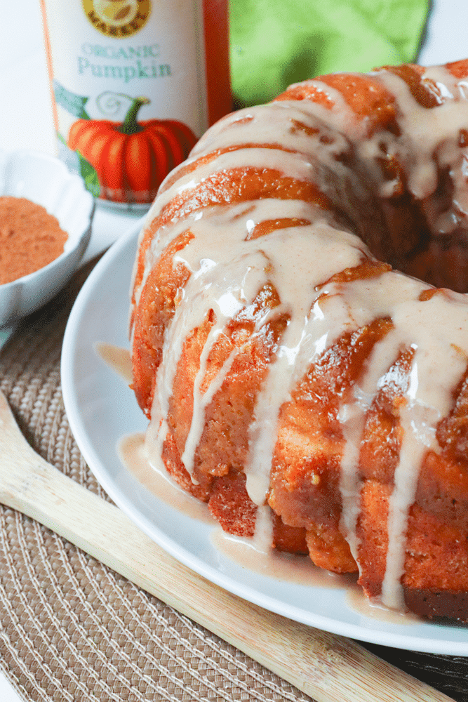 Pumpkin Spice Monkey Bread made with biscuits, spices, cream cheese and pumpkin is a fall treat that's over the top delicious! This easy to make bread is great as a dessert, snack or served for brunch.