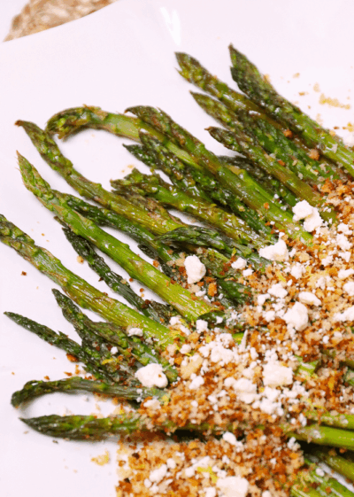 Roasted Asparagus topped with toasted Panko Breadcrumbs, Lemon and Feta cheese is a flavorful side dish that easy to make!