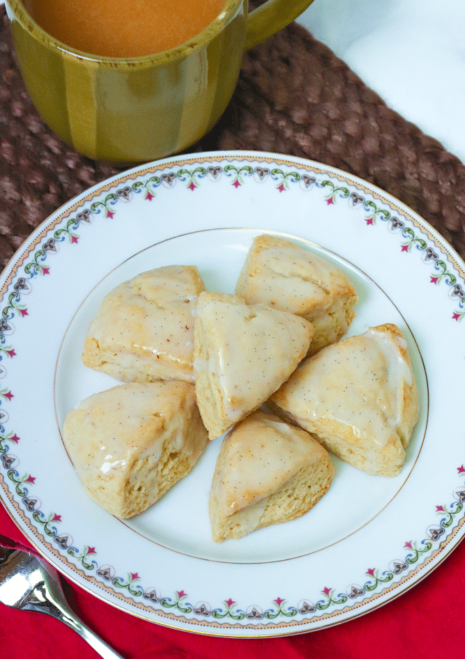 Easy to make Vanilla Scones are the perfect way to start the day! Topped with a vanilla bean glaze, these yummy treats are perfect for breakfast, brunch or as an treat with coffee or tea.