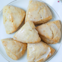 Easy to make Vanilla Scones are the perfect way to start the day! Topped with a vanilla bean glaze, these yummy treats are perfect for breakfast, brunch or as an treat with coffee or tea.