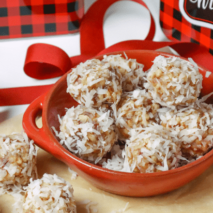 Coconut Date Balls with gift tins are the perfect Christmas treat for friends. A no-bake, easy recipe made with butter, dates, pecans, rice cereal and coconut. This healthy cookie is always a favorite at the holidays.