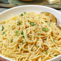 Instant Pot Garlic Parmesan Noodles is comfort food made in 20 minutes. Made with butter, garlic, chicken stock, pasta, Parmesan salt and pepper, this easy recipe is perfect for a week night meal when you've got to get supper on the table in a hurry.