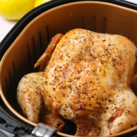 Easy to make Air Fryer Whole Chicken flavored with Montreal Steak Seasoning. Cooked in 50 minutes is tender and juicy with a crispy, flavor packed skin.