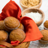 Pumpkin Coconut Muffins are tender, moist and easy to make. These muffins made with canned pumpkin, coconut, flour, brown sugar, cinnamon and nutmeg will soon become your favorite muffin treat perfect for any time of the year.