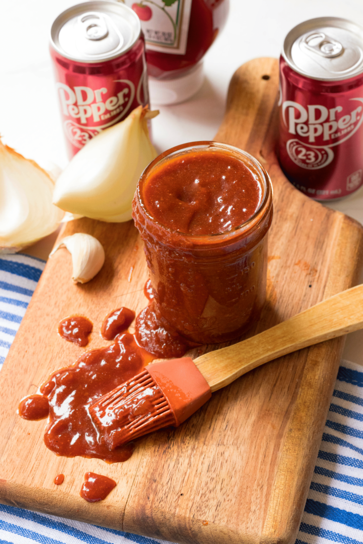 BBQ Sauce made with Dr Pepper soda, brown sugar, honey, ketchup, vinegar, chili powder garlic and tomato paste is so easy to make!