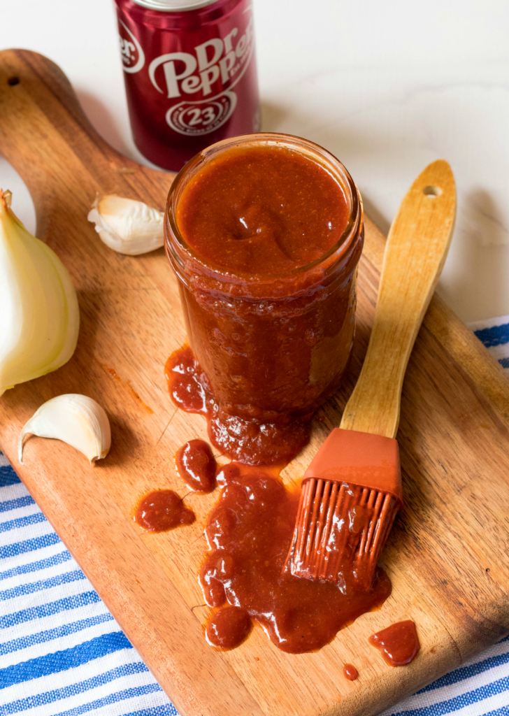 BBQ Sauce made with Dr Pepper soda, brown sugar, honey, ketchup, vinegar, chili powder garlic and tomato paste is so easy to make!