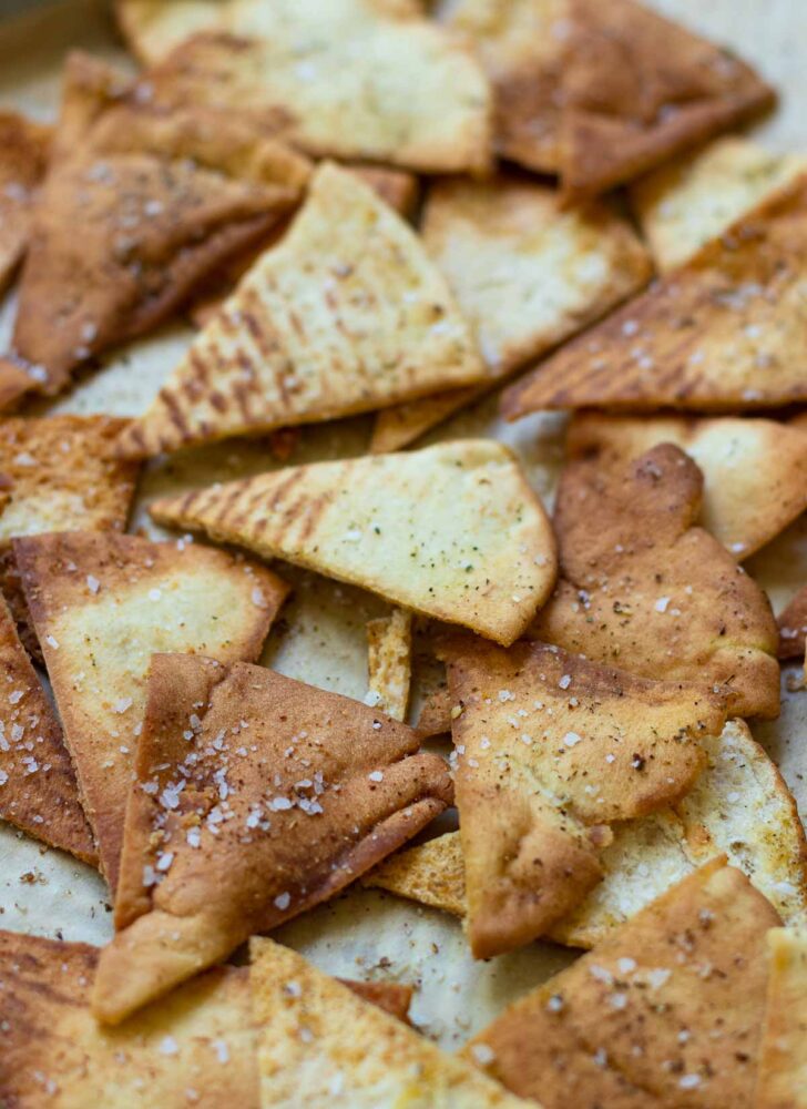 Homemade Pita chips made with store bought pita bread, olive oil, salt or za'atar. They are perfect for all your dips or for snacking.