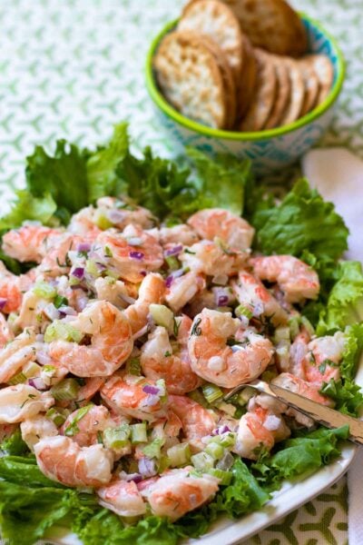 Shrimp Salad made with cooked shrimp, celery, red onion with fresh dill and parsley tossed in a lemony mayonnaise dressing is so easy to make. This cool and refreshing salad is pefect as an appetizer, lunch or even a main dish at supper.