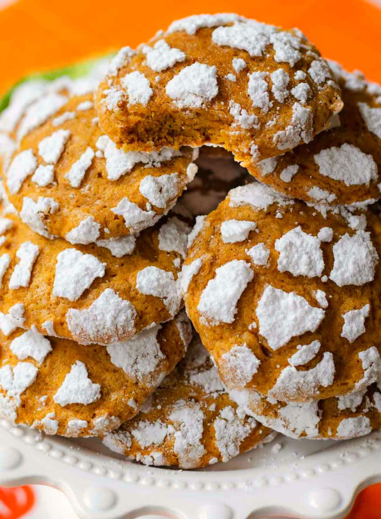 Pumpkin Crinkle Cookies with powdered sugar are everyone's favorite fall treat!