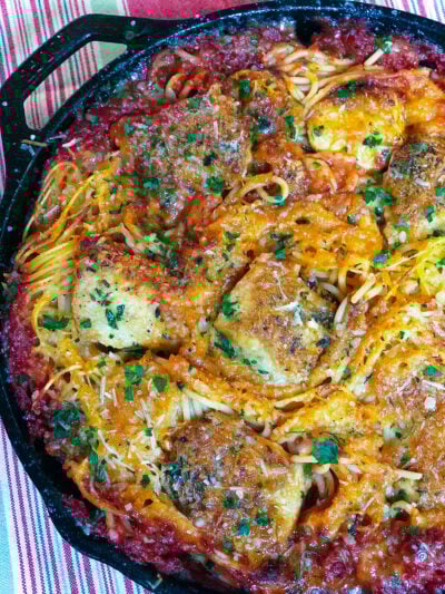 On pan Skillet Chicken Spaghetti on a striped towel to cool.