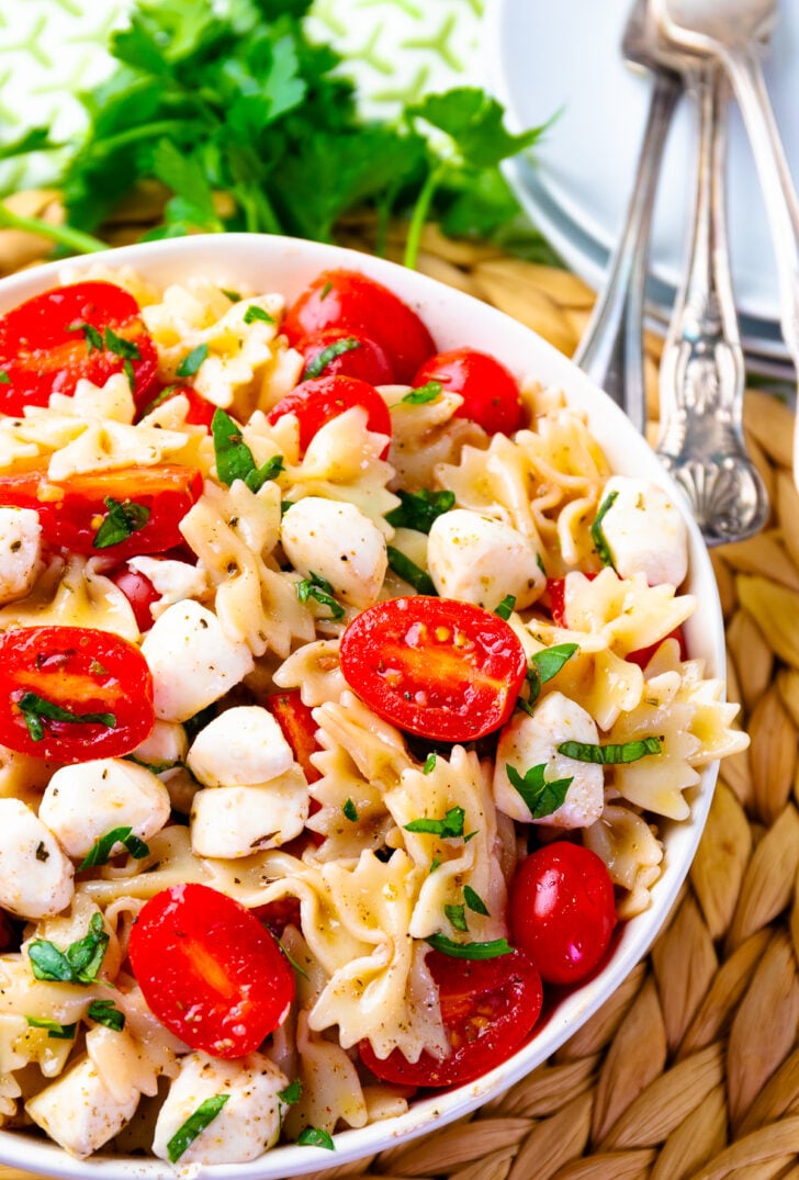 A bowl full of the best Caprese Pasta salad is fresh and easy to make.