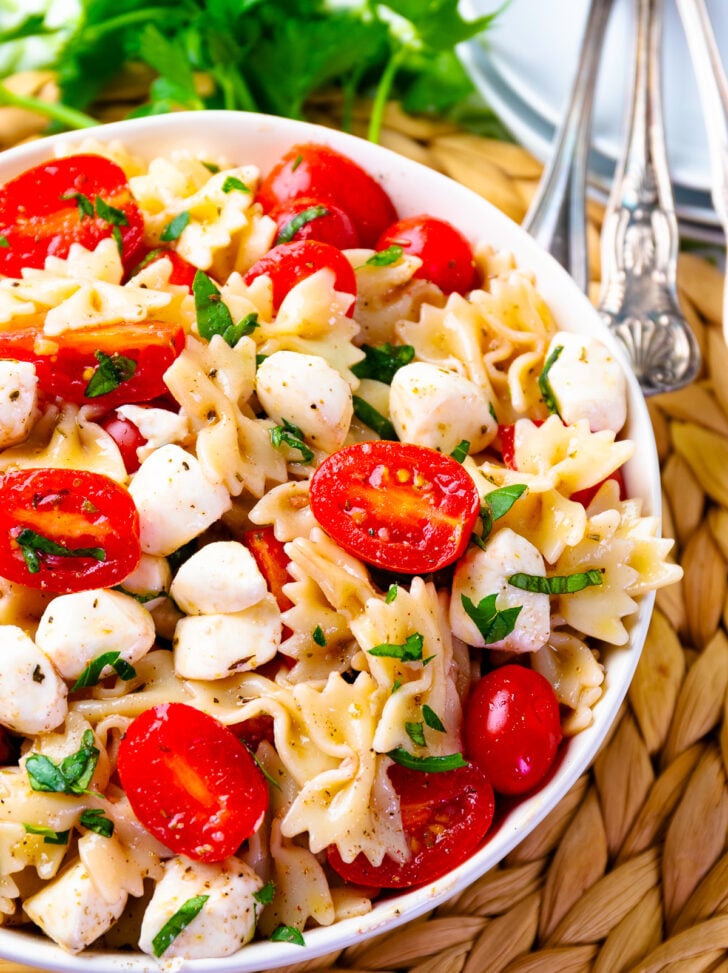 A bowl full of the best Caprese Pasta salad is fresh and easy to make.