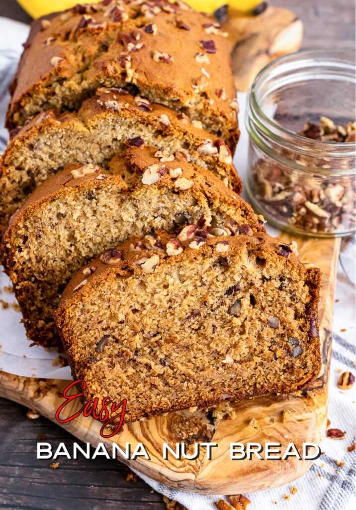 Sliced banana nut bread topped with nuts on wooden board, Pinterest pin for easy recipe