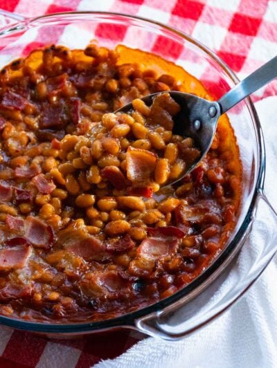Spoon serving Chipotle Bacon Baked Beans