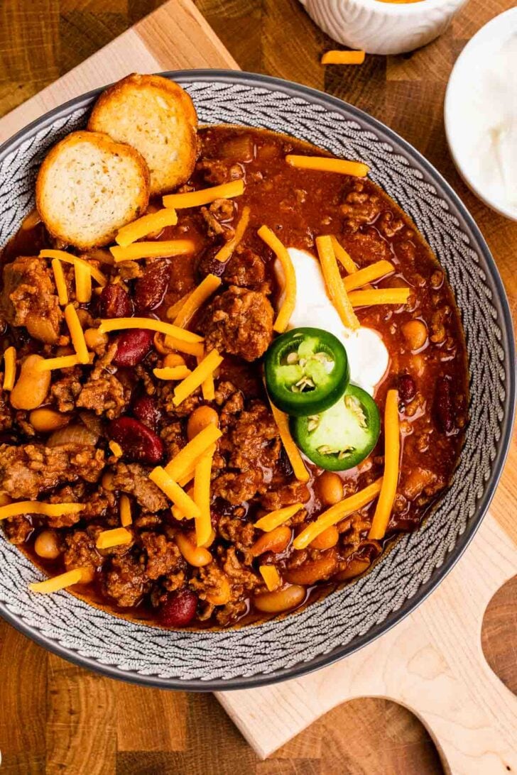 Jalapeños, cheese, and sour cream topping Bloody Mary Chili.