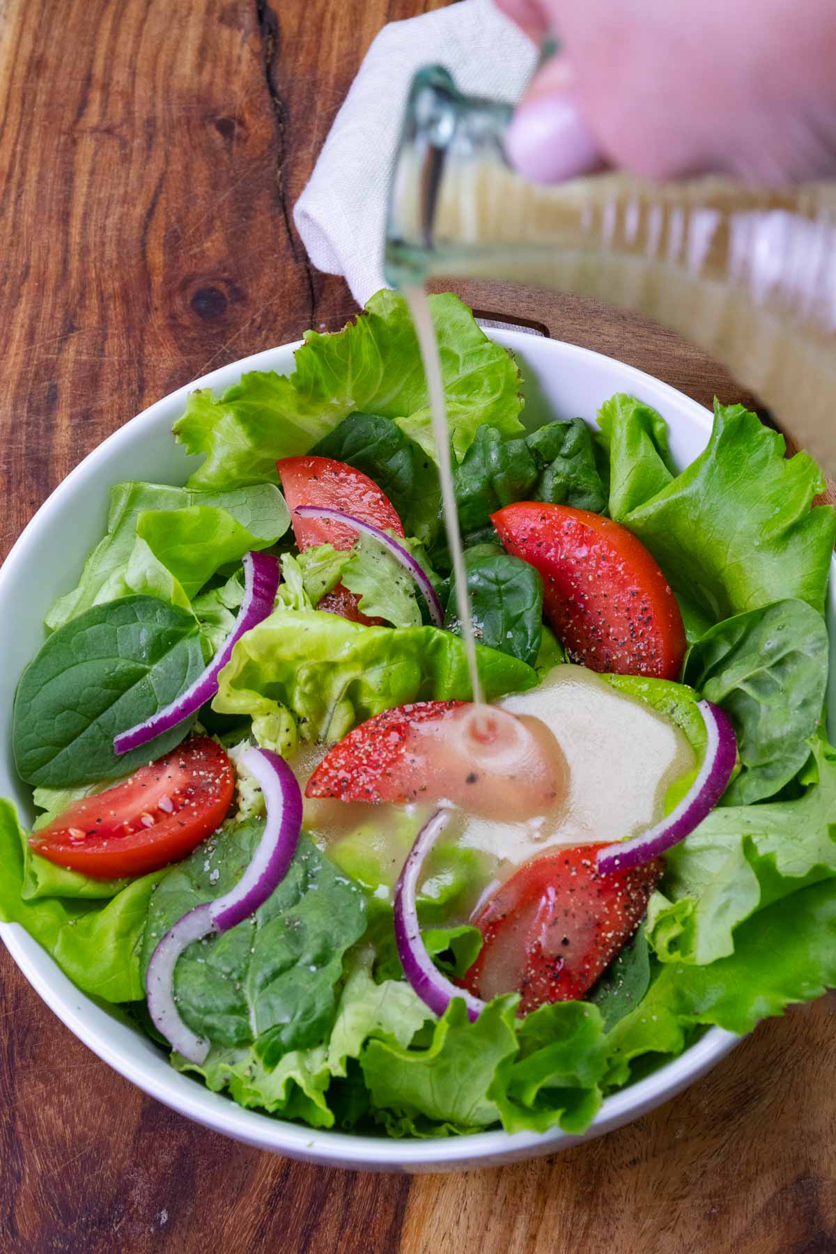 Everyday Green Salad is fresh, easy to make, with tomatoes, lettuce and onion. It's the best recipe that's simple and delicious.