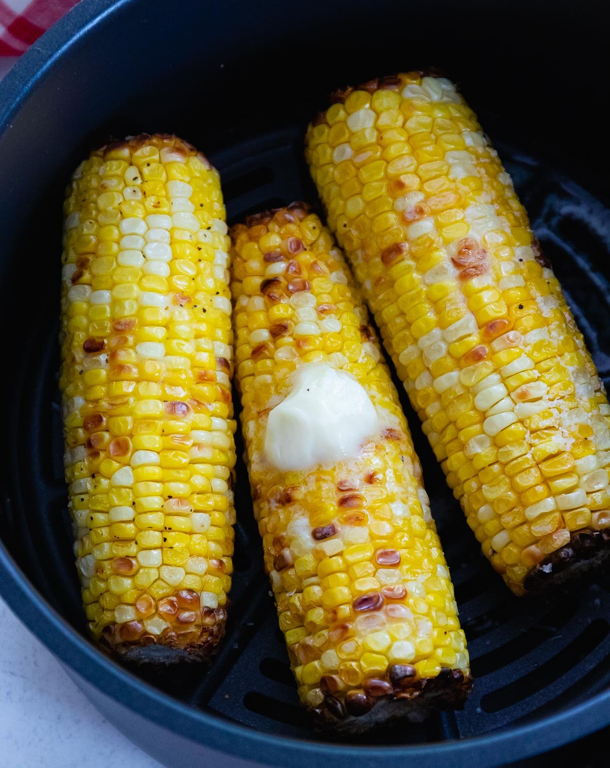 Air Fryer Corn On The Cob is perfectly cooked and delicious.