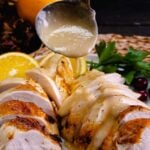 Gravy being poured on turkey