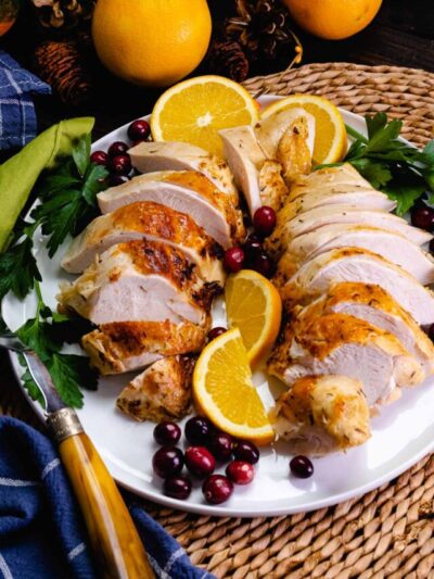 Whole turkey breast cooked in the crock pot is tender and juicy, then broil for a crispy skin that's perfect for any holiday.