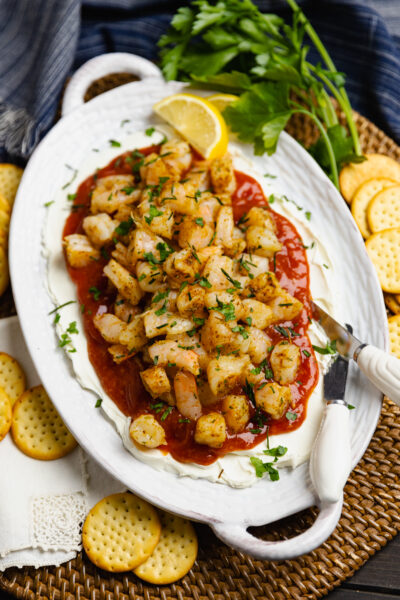 Layered Shrimp Dip with cream cheese and homemade cocktail sauce is a delicious, easy-make appetizer perfect for any party of spur of the moment gathering.