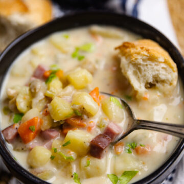 Crock Pot Ham And Potato Soup is full of vegetables and the perfect comfort food served with warm bread on a chilly night.