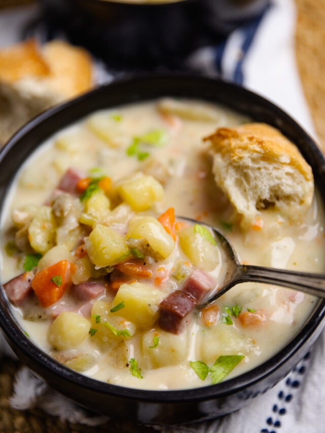 Crock Pot Ham And Potato Soup is full of vegetables and the perfect comfort food served with warm bread on a chilly night.