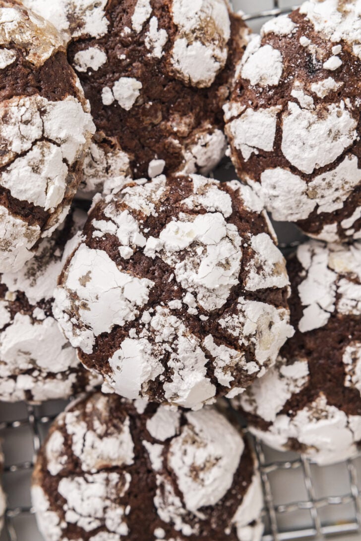 Close up of the crinkly cookies on a wire rack.