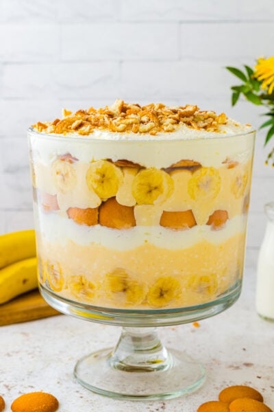 Banana pudding in a large bowl. Layered perfectly with bananas cream whipped topping and vanilla wafers.