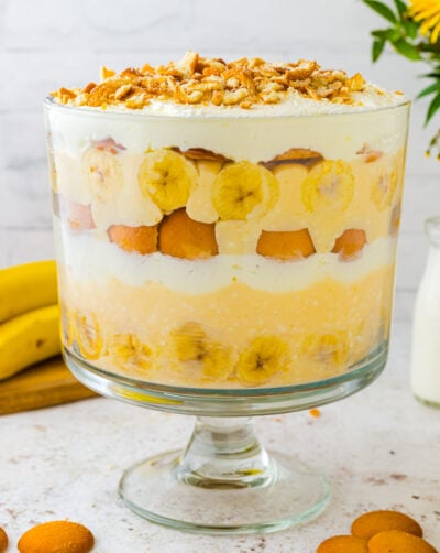 Banana pudding in a large bowl. Layered perfectly with bananas cream whipped topping and vanilla wafers.